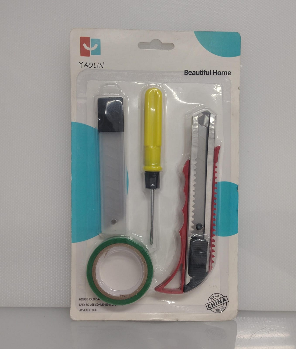 SET X4 DE HERRAMIENTAS BEAUTIFUL HOME (1 CUTER RETRACTIL 15 CM - 1 HOJA METALICA - 1 DESTORNILLADOR TIPO PLANO 13 CM - 1 CINTA ADHESIVA) PL06-11