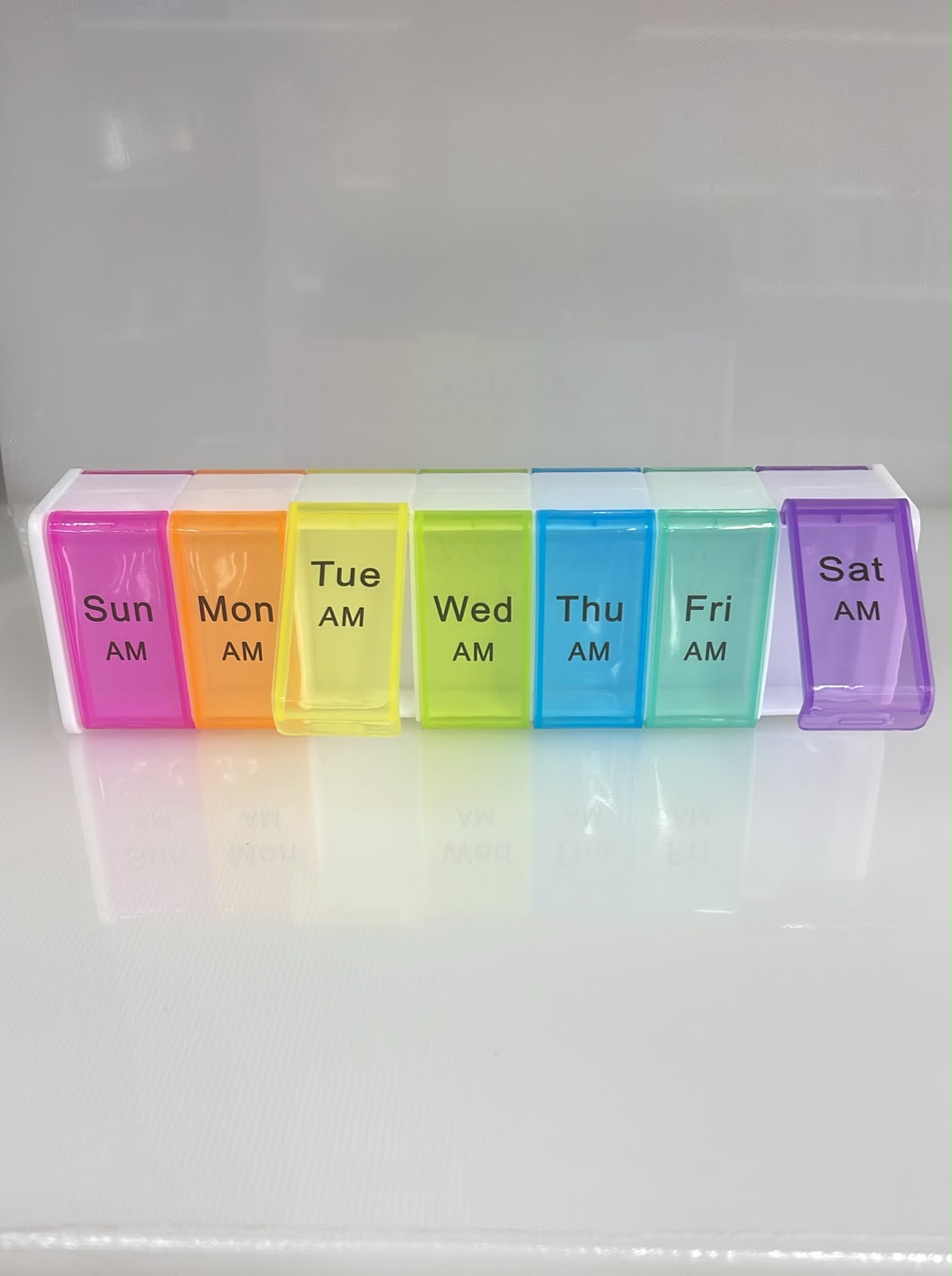 ENVASE DE PLASTICO DISENO SEMANA PARA ALMACENAMIENTO CON 14 COMPARTIMIENTOS COLORS 22X6 CM PL11-18